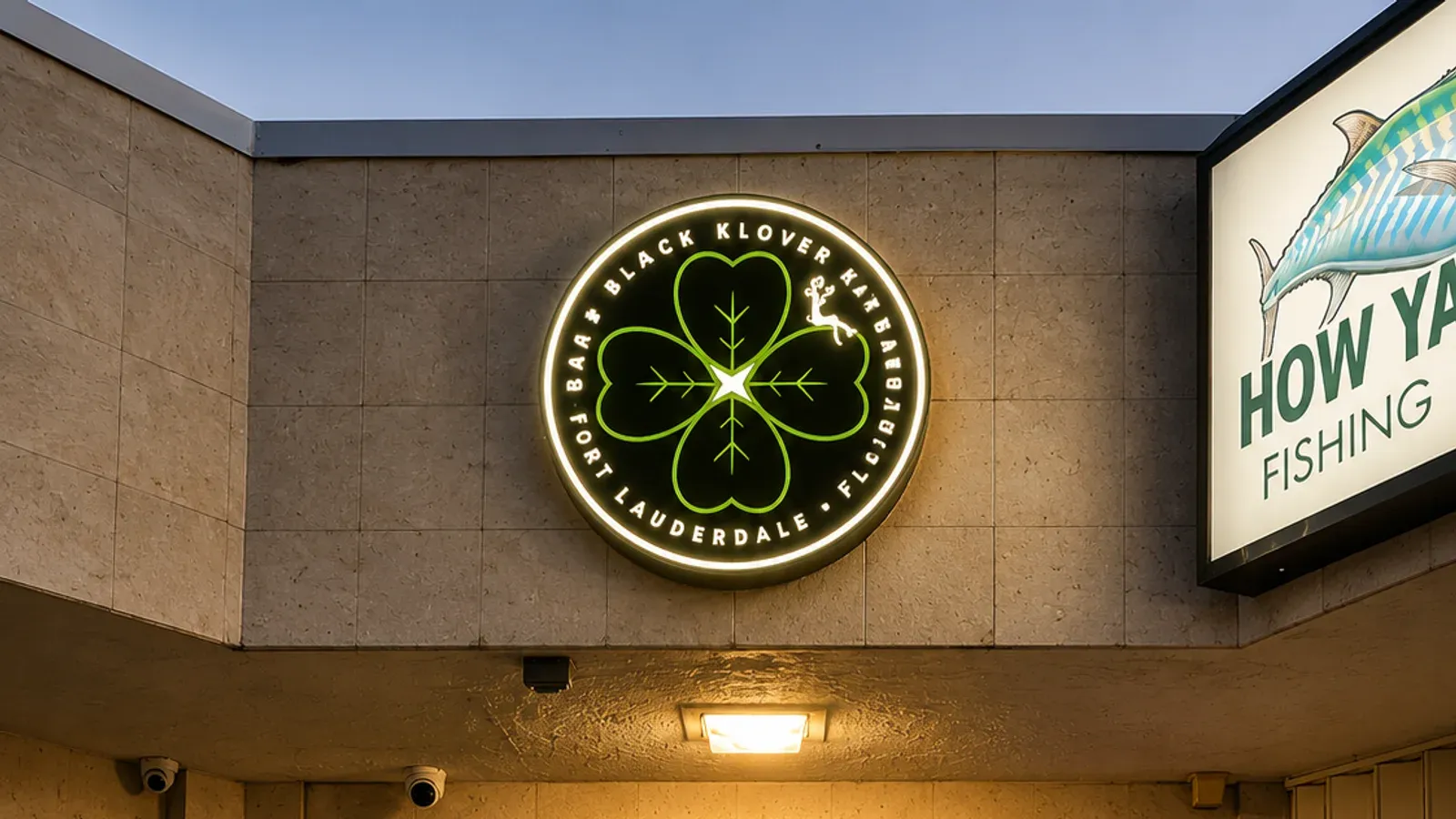 Illuminated Black Klover Fort Lauderdale storefront sign