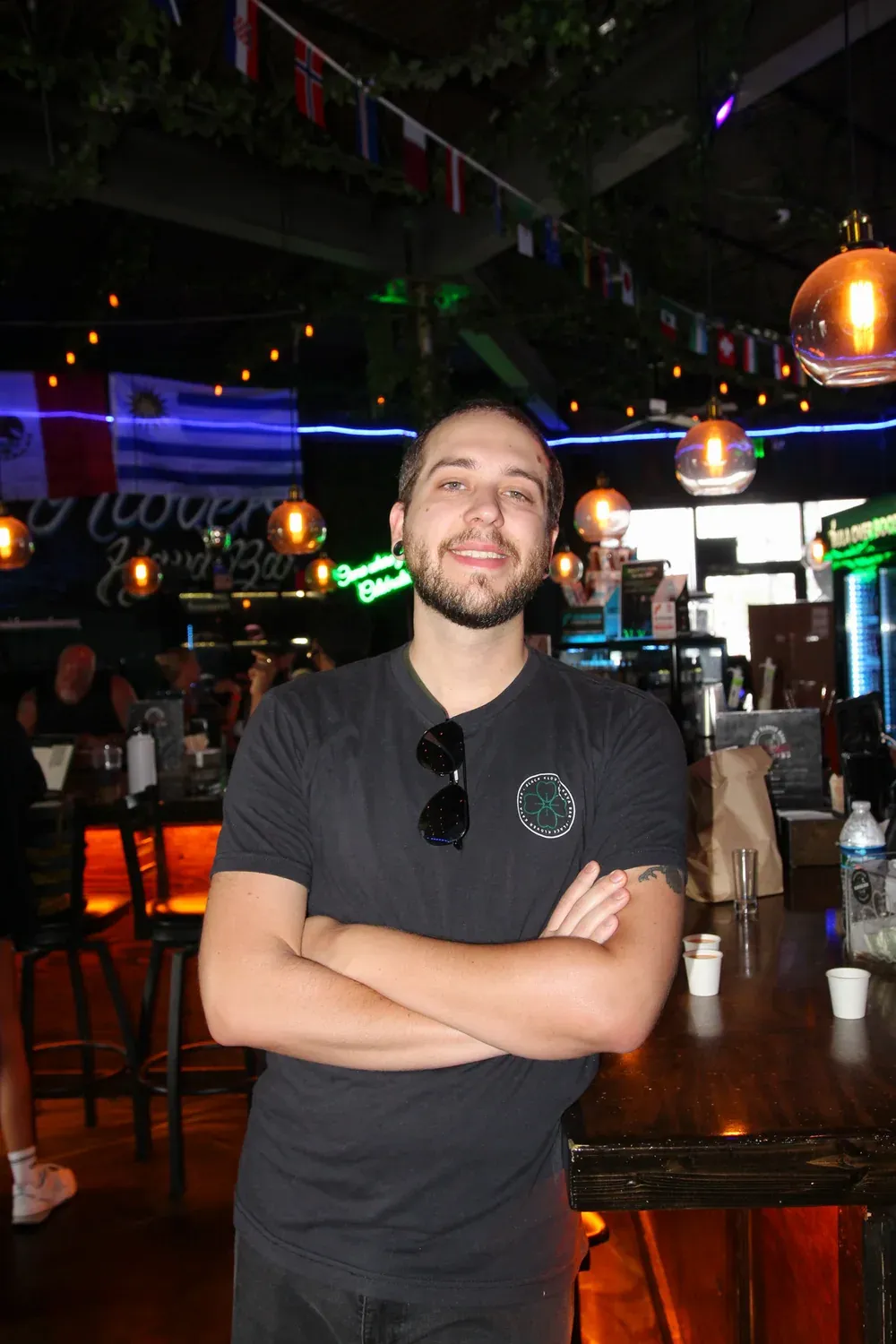 Logan smiling inside Black Klover